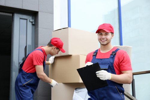 Removal crew sorting recyclable moving materials in Surrey