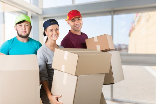Moving team handling a flat move in Surrey with access challenges