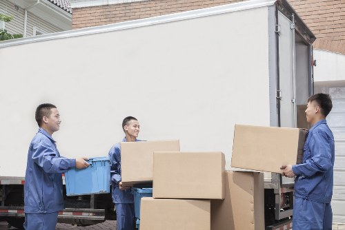 Office desks and furniture being moved into a new Surrey premises