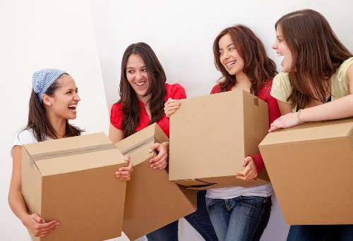 Removal team preparing a van for a Surrey property move