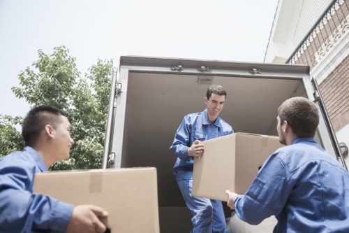 Office relocation with desks and equipment being moved