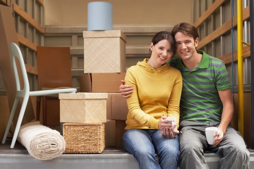 Removal company complaints procedure with moving boxes and paperwork