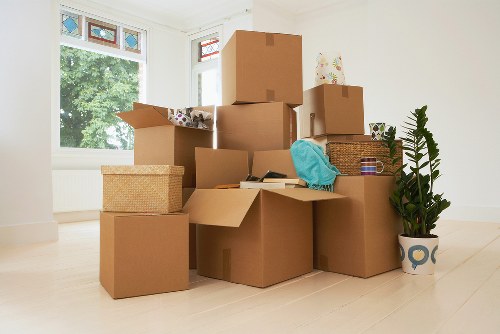Local removal team loading furniture for a Surrey move