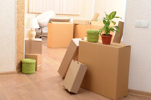 Mover handling furniture carefully during transport